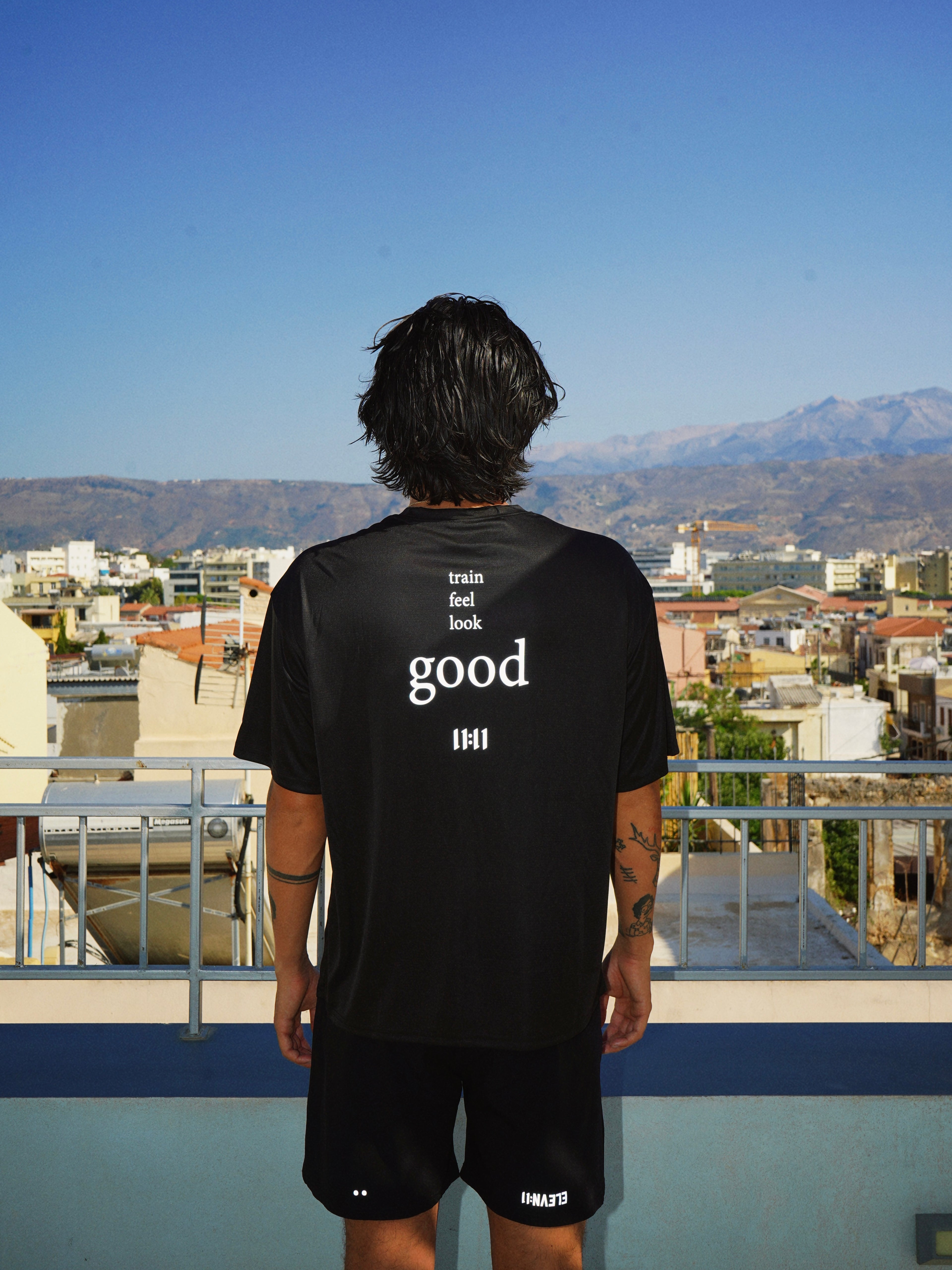 "Train, feel, look good" oversized performance t-shirt
