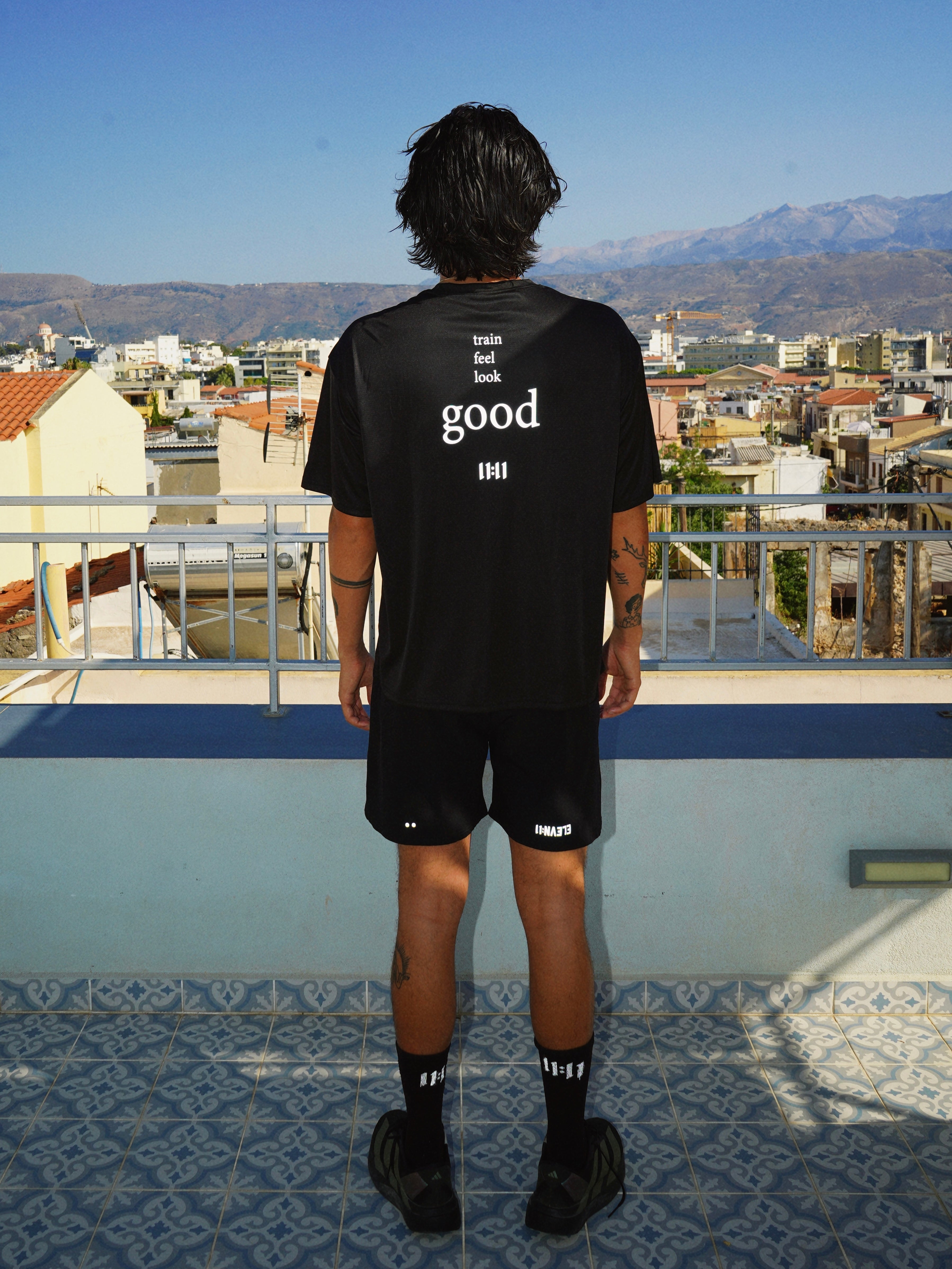 "Train, feel, look good" oversized performance t-shirt